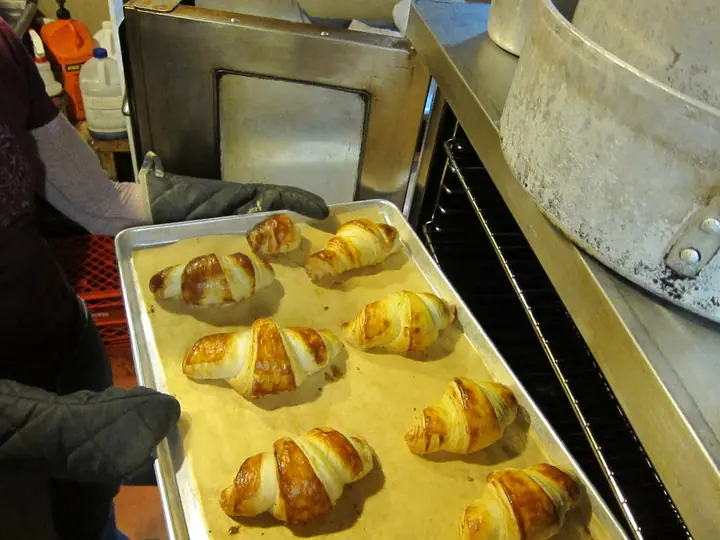 Croissants coming out of the oven